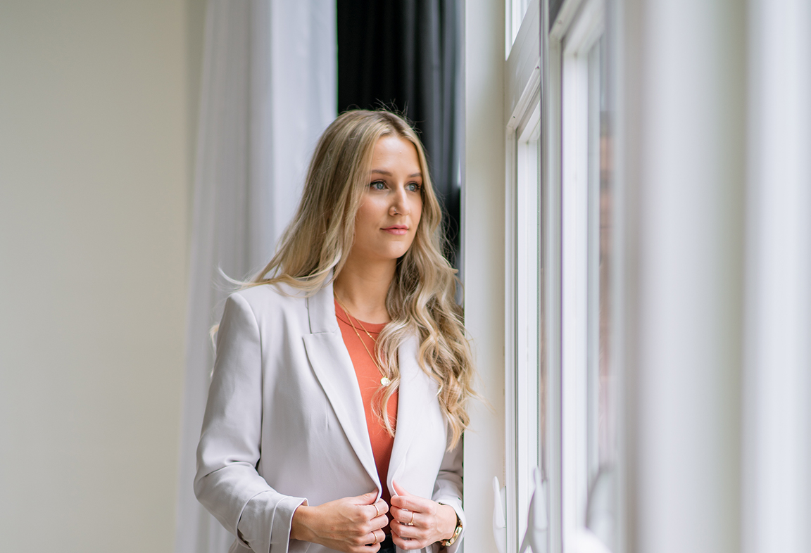 Business owner thinking about how to define a target audience for small busines