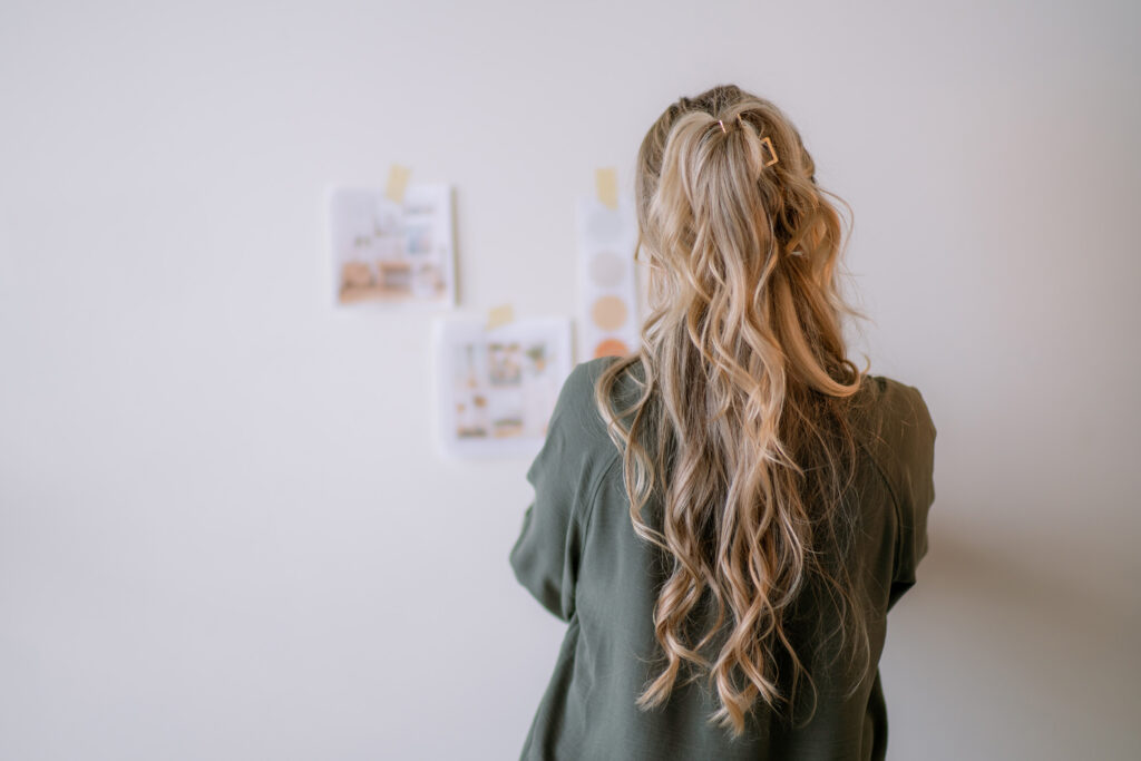 Evaluating a mood board to choose a brand refresh vs rebrand for a growing business.